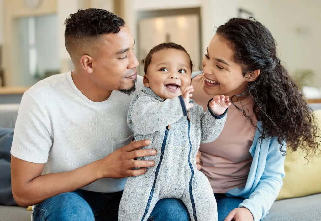 Loving family with baby after vasectomy reversal in Colombia restored fertility